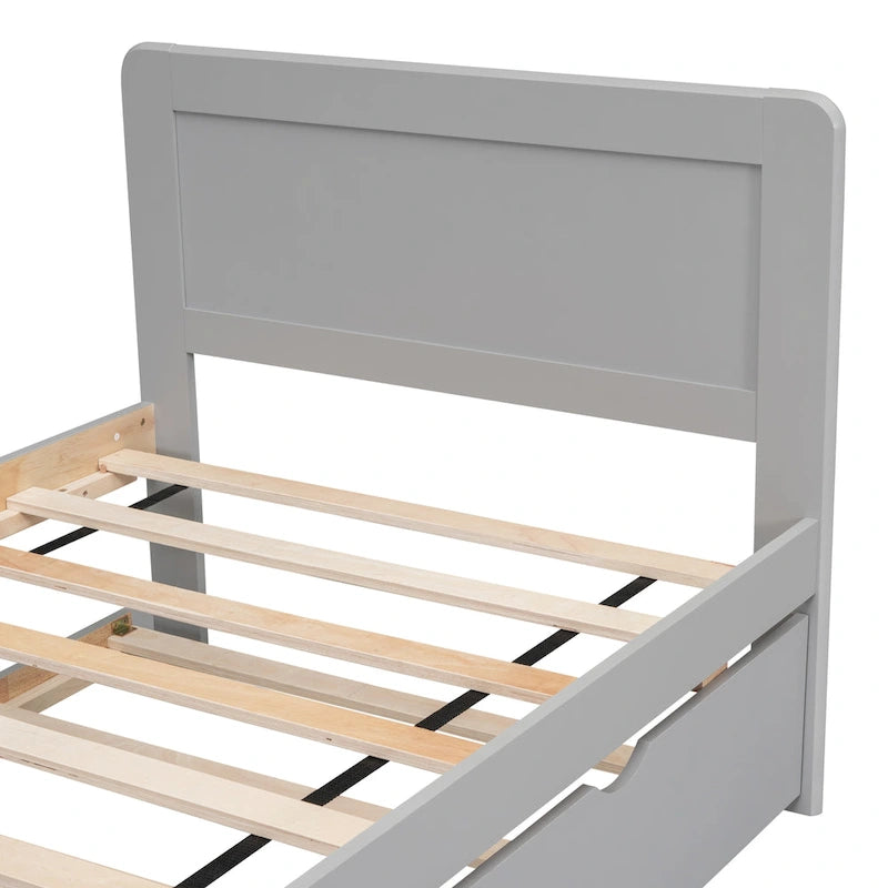 Letto in legno grigio a una piazza con letto estraibile